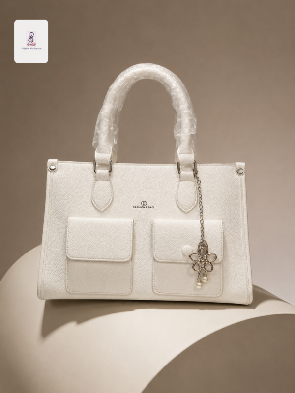 White Luxurious Handbag with Front Pockets & Charm